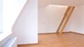 Wohnzimmer mit Zugang zur zweiten Ebene