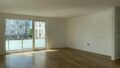Wohnzimmer mit offener Küche